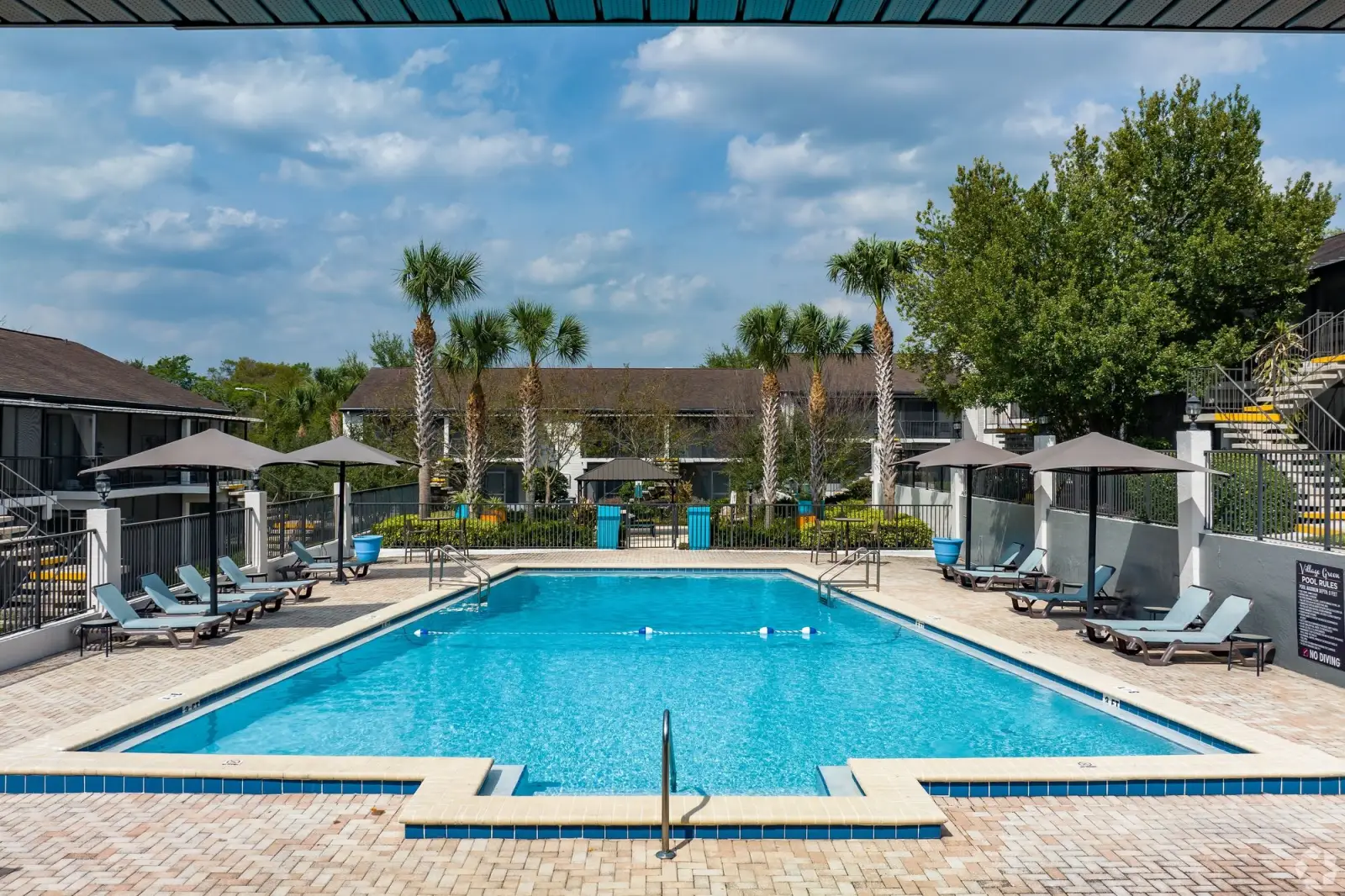 Resort-style swimming pool at The Essex - Apartments for rent in Altamonte Springs